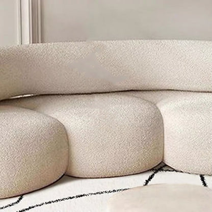 Curved Lamb Cashmere Fabric Sofa In The Living Room